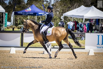 Jasmine Haynes and Steendieks Champ Of Glory showing balanced power and strength in the FEI Pony Team Test 12-16 years.