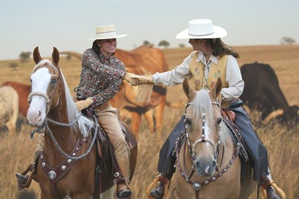 The famous Cowboy handshake.
